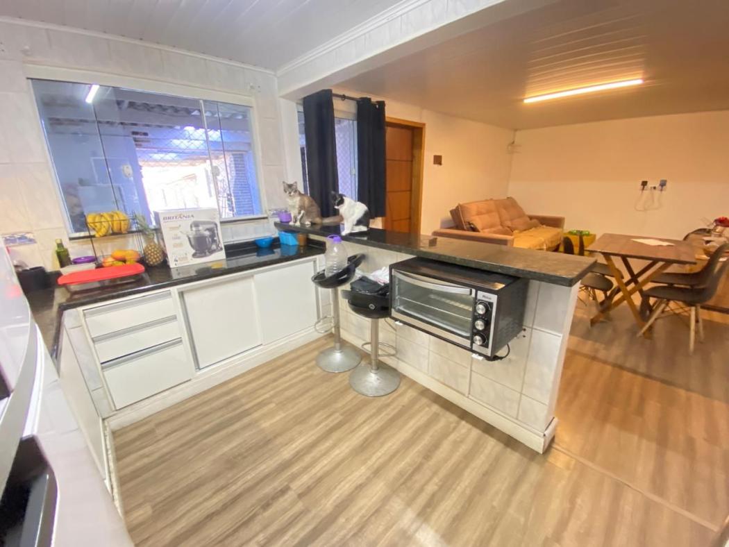 Casa com 6 dormitórios à venda, 200 m² por R$ 849.000,00 - Pinheirinho - Curitiba/PR - foto 2