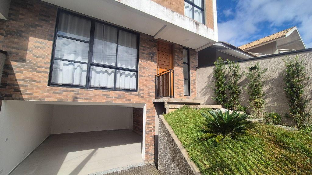Sobrado com 3 dormitórios para alugar, 143 m² por R$ 5.259,42/mês - Tingui - Curitiba/PR - foto 2